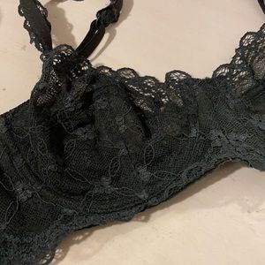 Forest green lacy balconette bra.